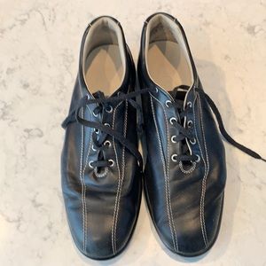 Tod’s men’s black leather bowling shoes